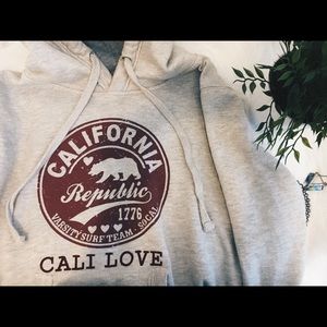Grey and maroon California hoodie sweater.