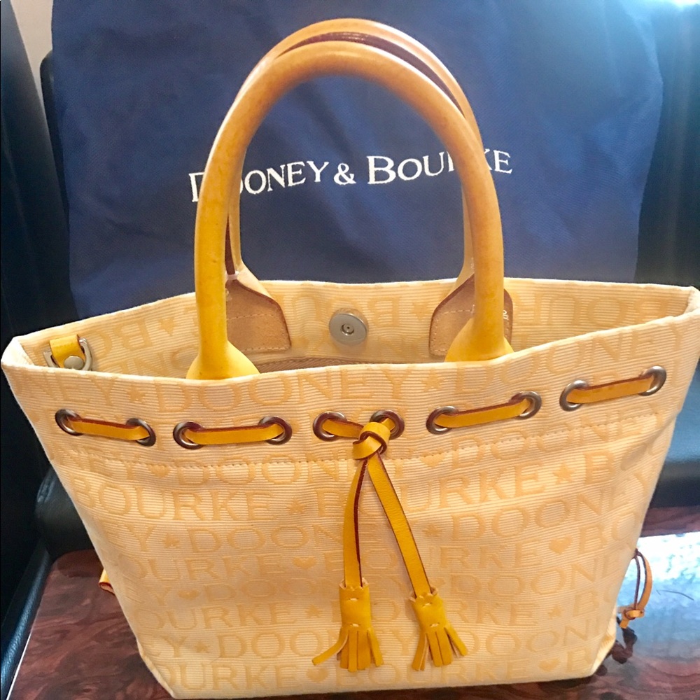 New Yellow Signature Dooney and Bourke handbag