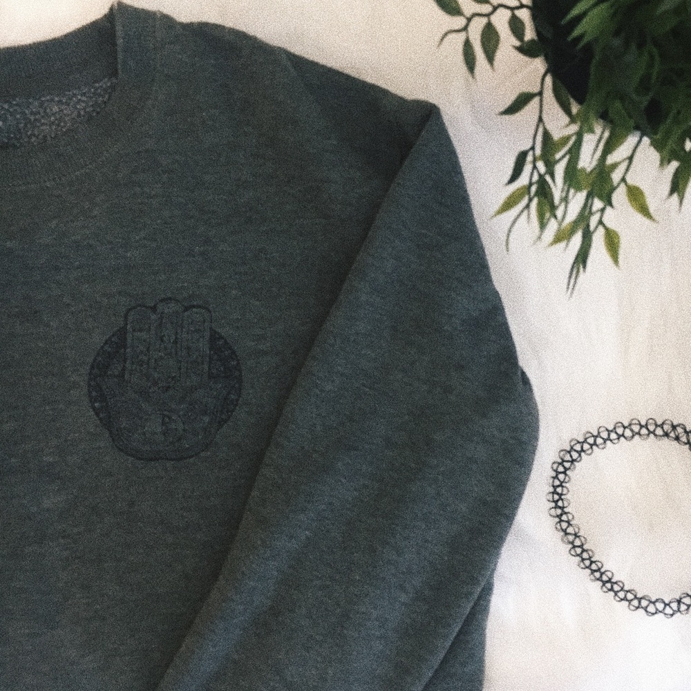 Dark green with a design.