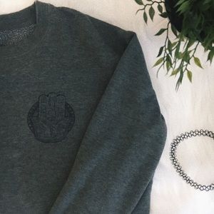 Dark green with a design.