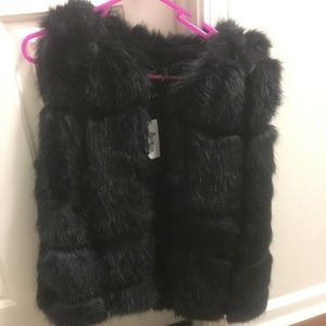 Black faux fur vest