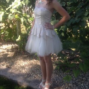 A creamy off-white homecoming dress.