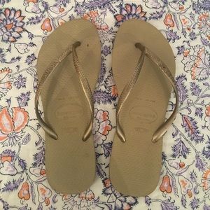 Gold Havaianas.