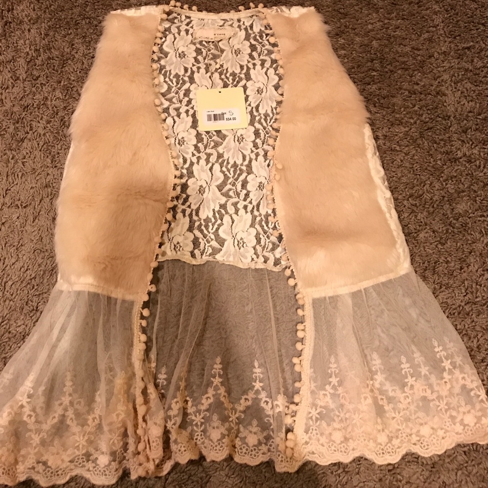 Cream colored faux fur and lace vest