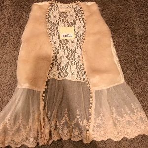 Cream colored faux fur and lace vest