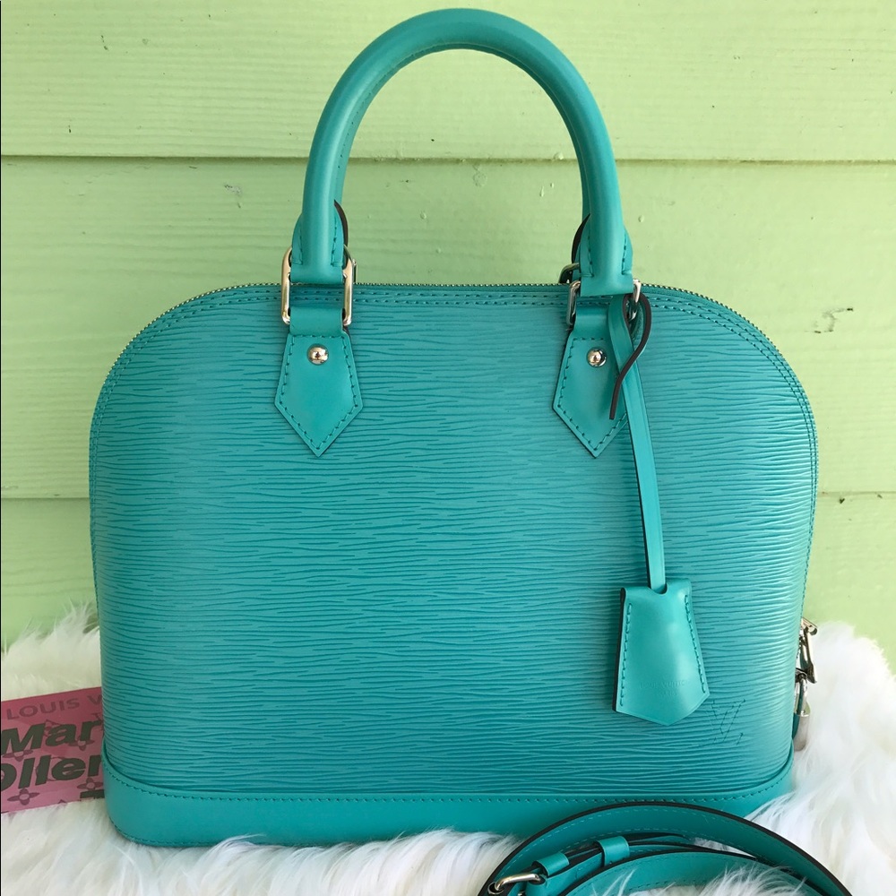 Authentic Louis Vuitton alma pm epi
