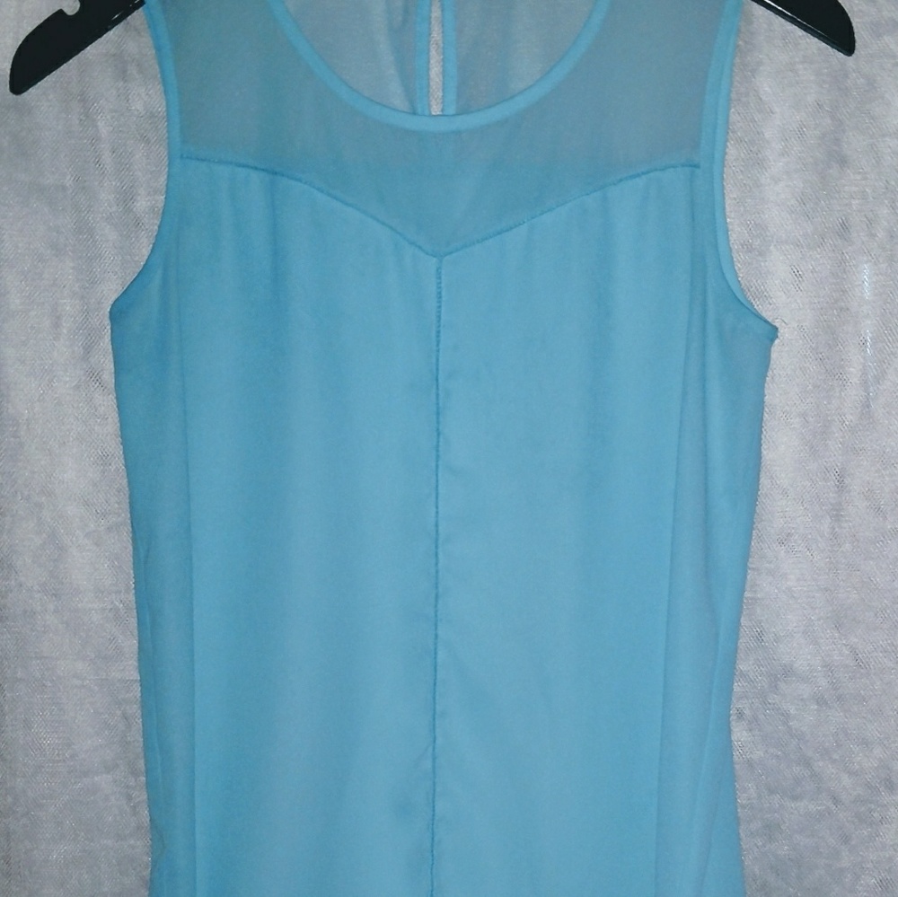Sheer light blue blouse.