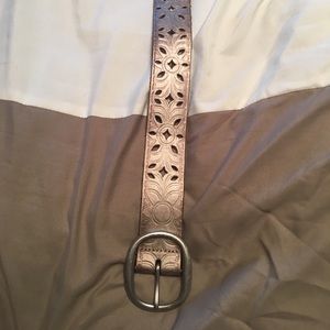 A shiny patterned belt