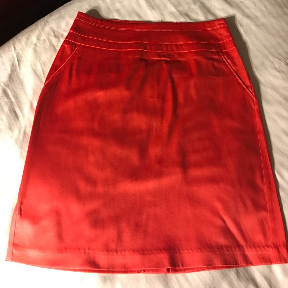 Coral zip up skirt.
