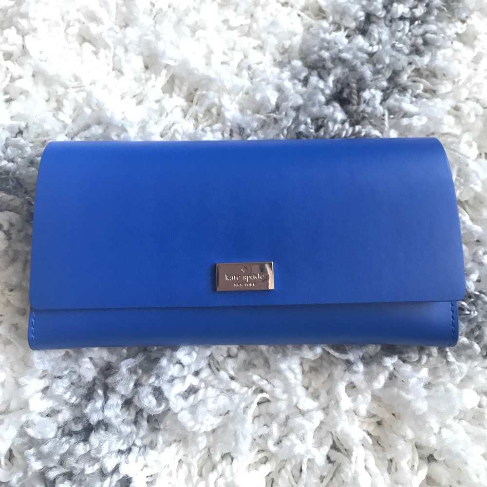 Kate Spade blue wallet with a real pop inside