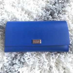Kate Spade blue wallet with a real pop inside