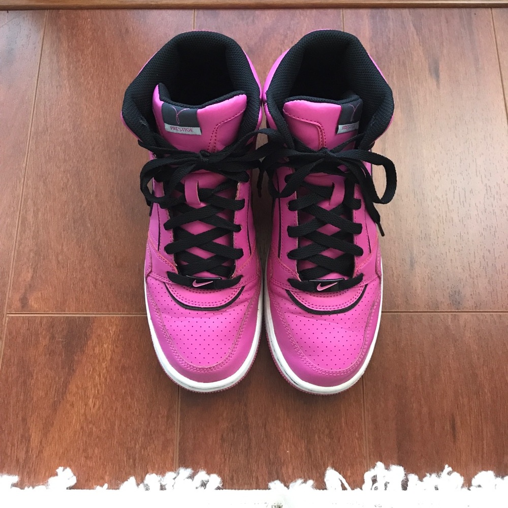 Hot pink Nike Hi-top shoes
