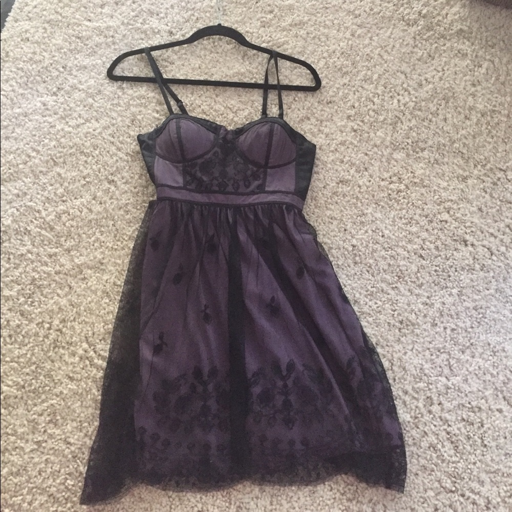 Purple polyester lining with black decorated lace