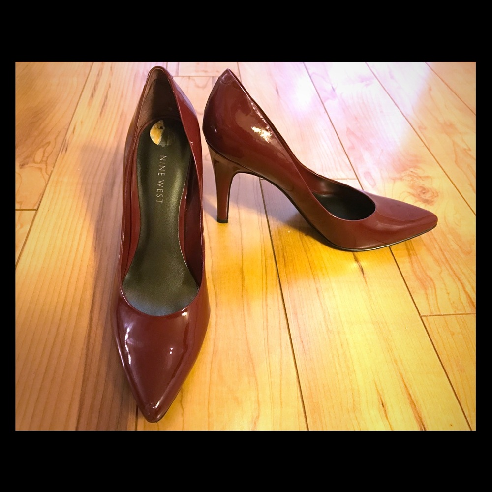 Nine West red patent pumps