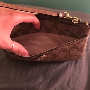 Coach classic Signature print wristlet