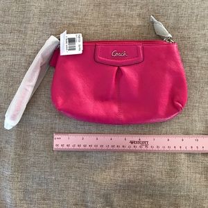 Coach large leather wristlet in fuchsia/hot pink
