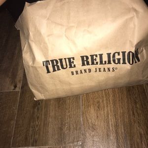 Selling female True Religion Jeans.