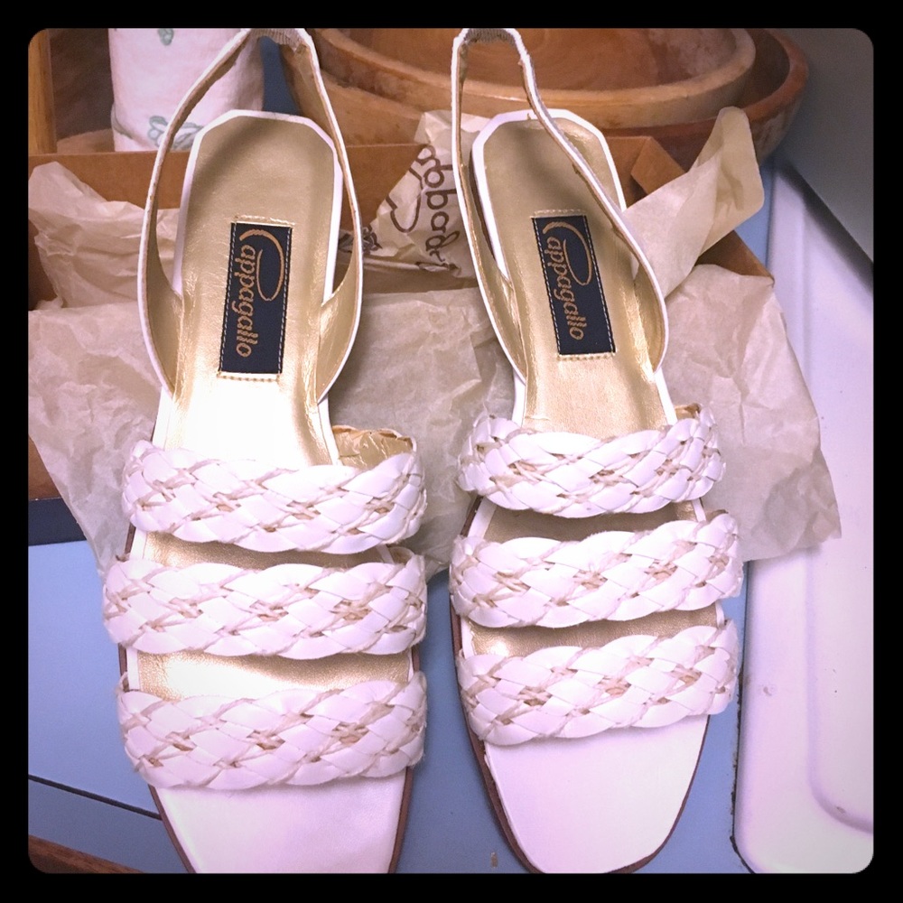 White Pappagallo flat sandals.
