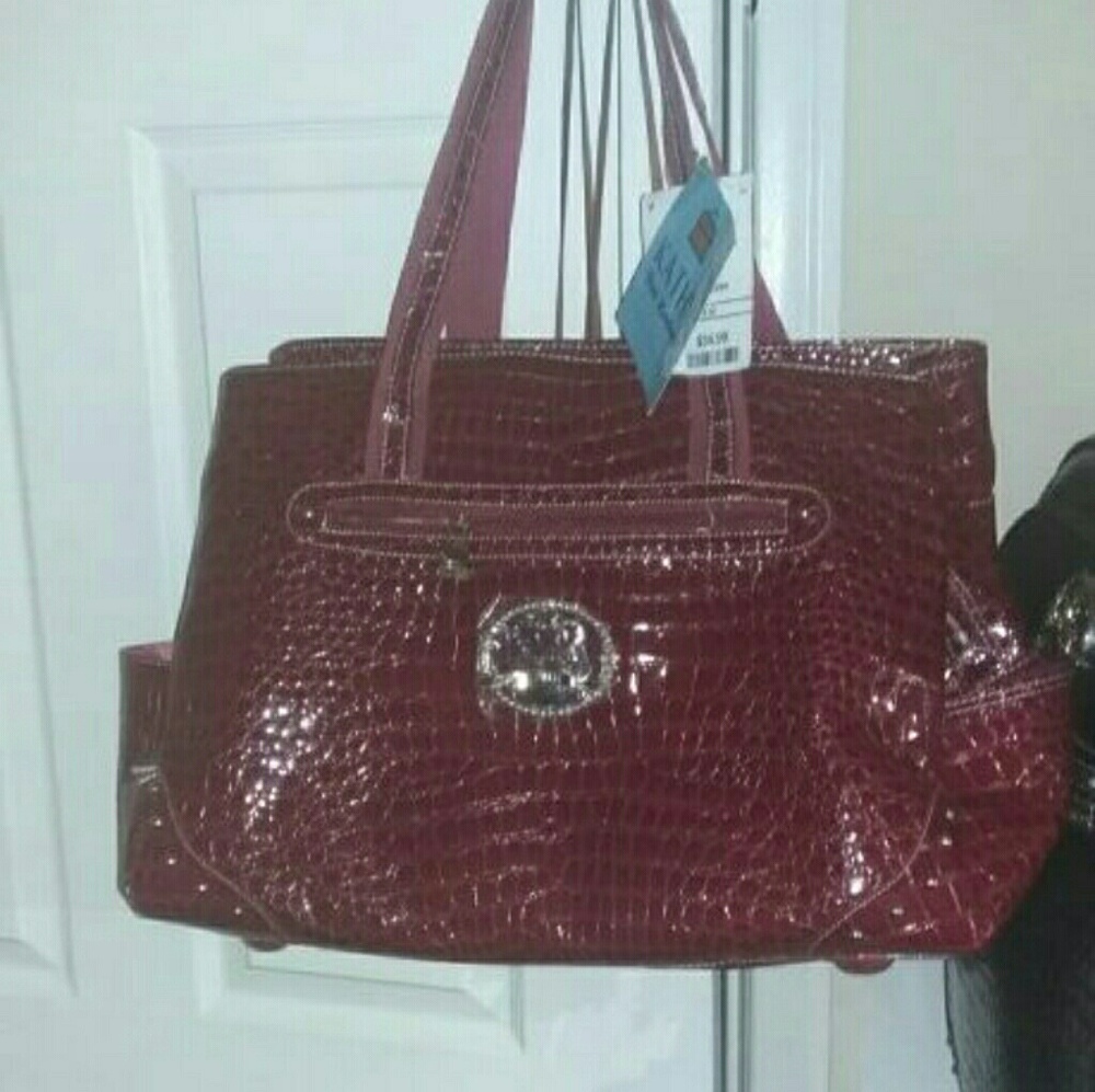 NWT Red Kathy Van Zeeland carry-on bag.