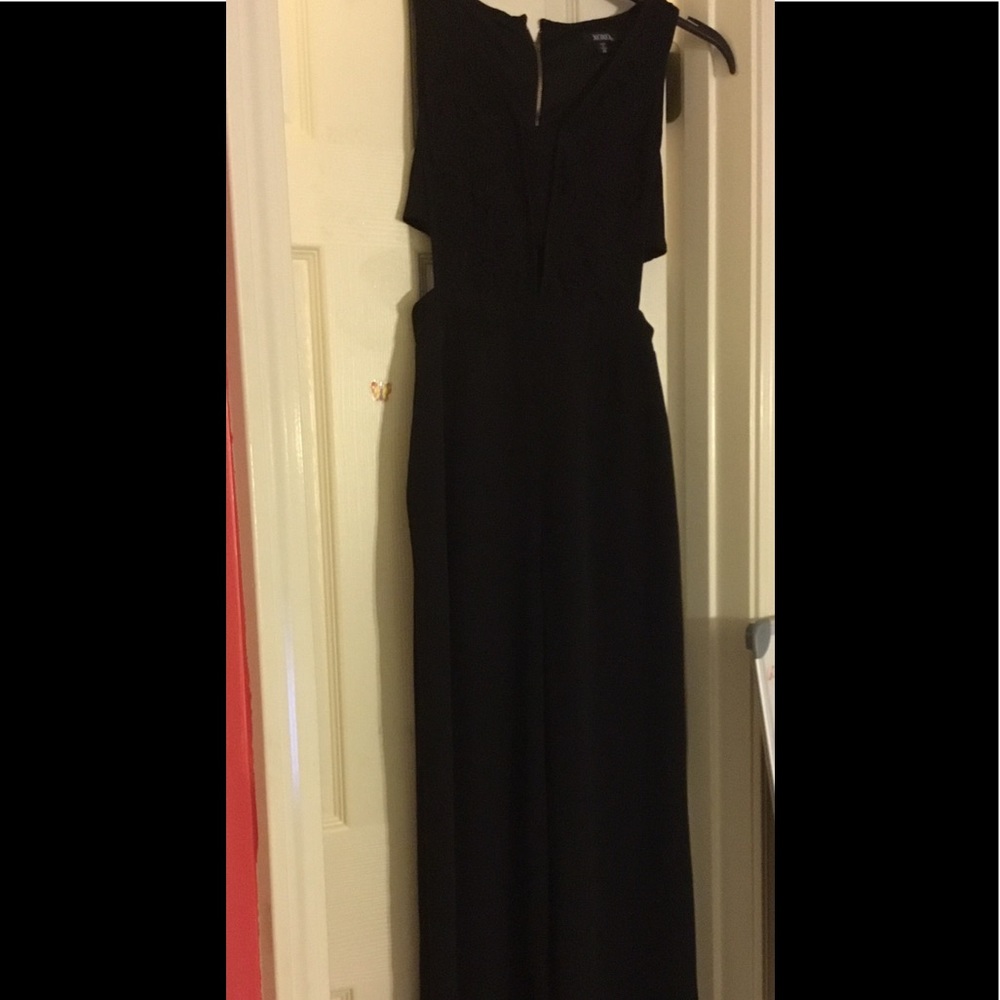 Sleeveless black zip up jumpsuit