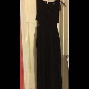 Sleeveless black zip up jumpsuit