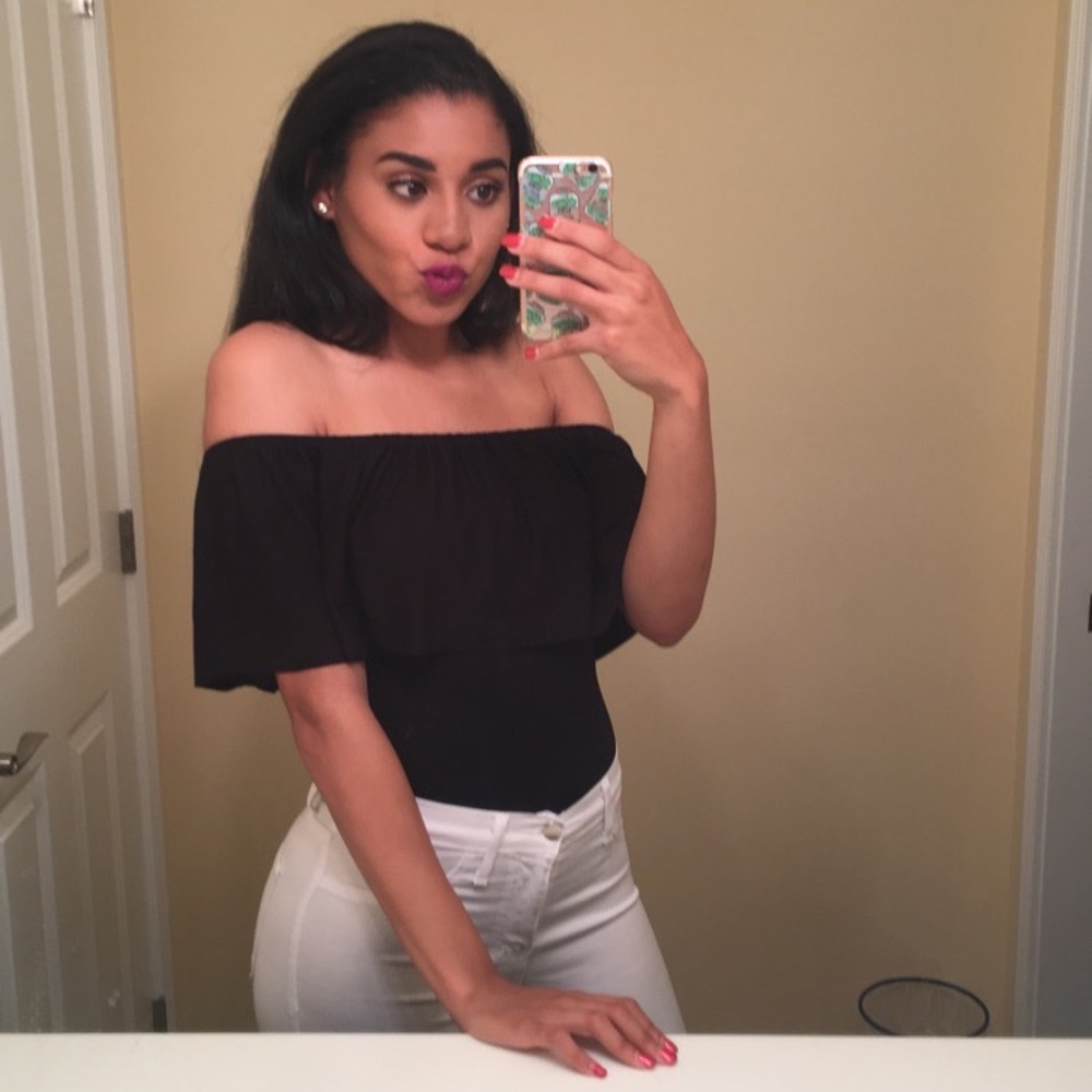 Off-the-shoulder black bodysuit; size small.