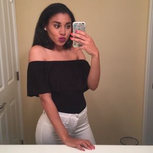 Off-the-shoulder black bodysuit; size small.
