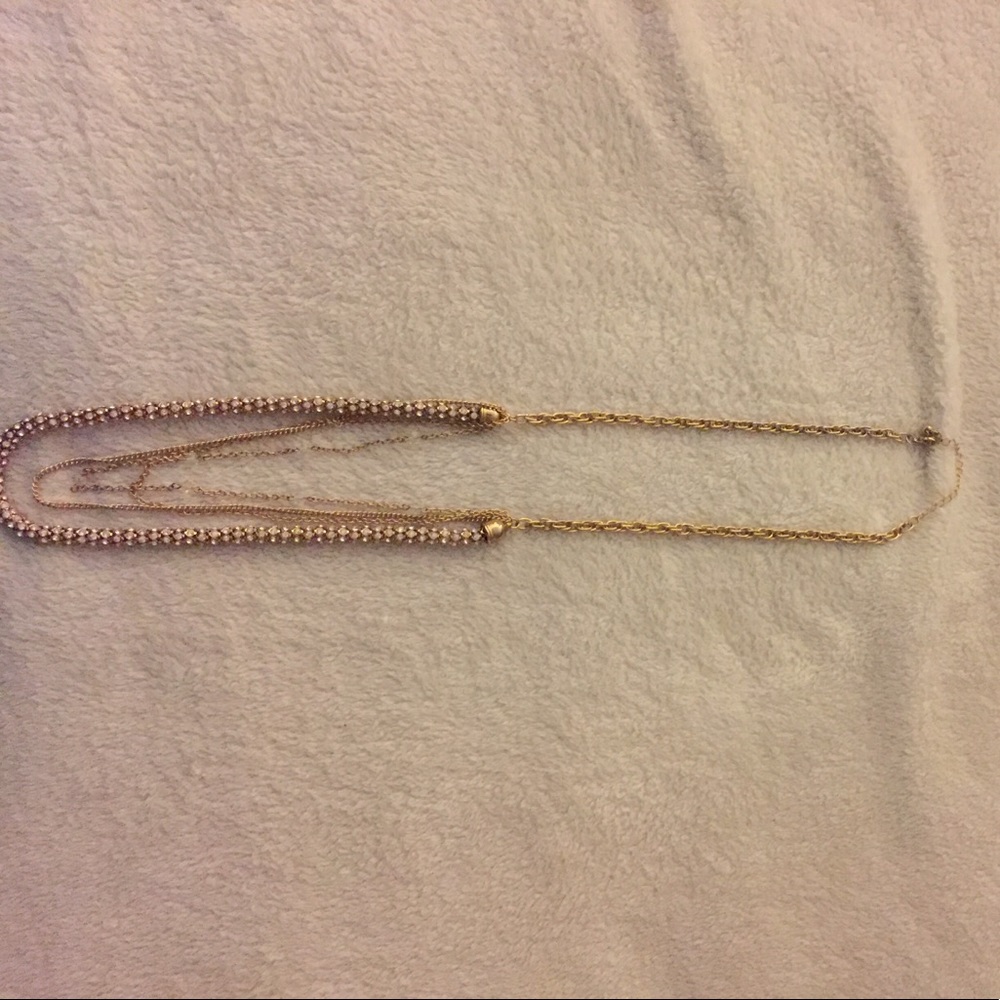 Long gold necklace