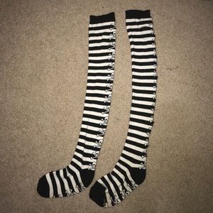 Black and white thigh high skull socks