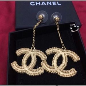Authentic Chanel Dangling CC logo.