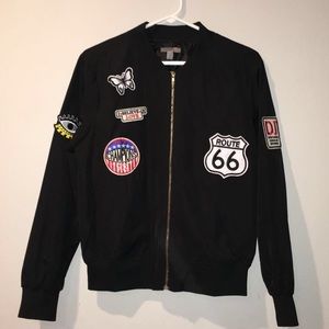 black bomber jacket with patches