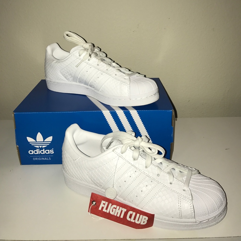 All white Adidas superstar sneakers
