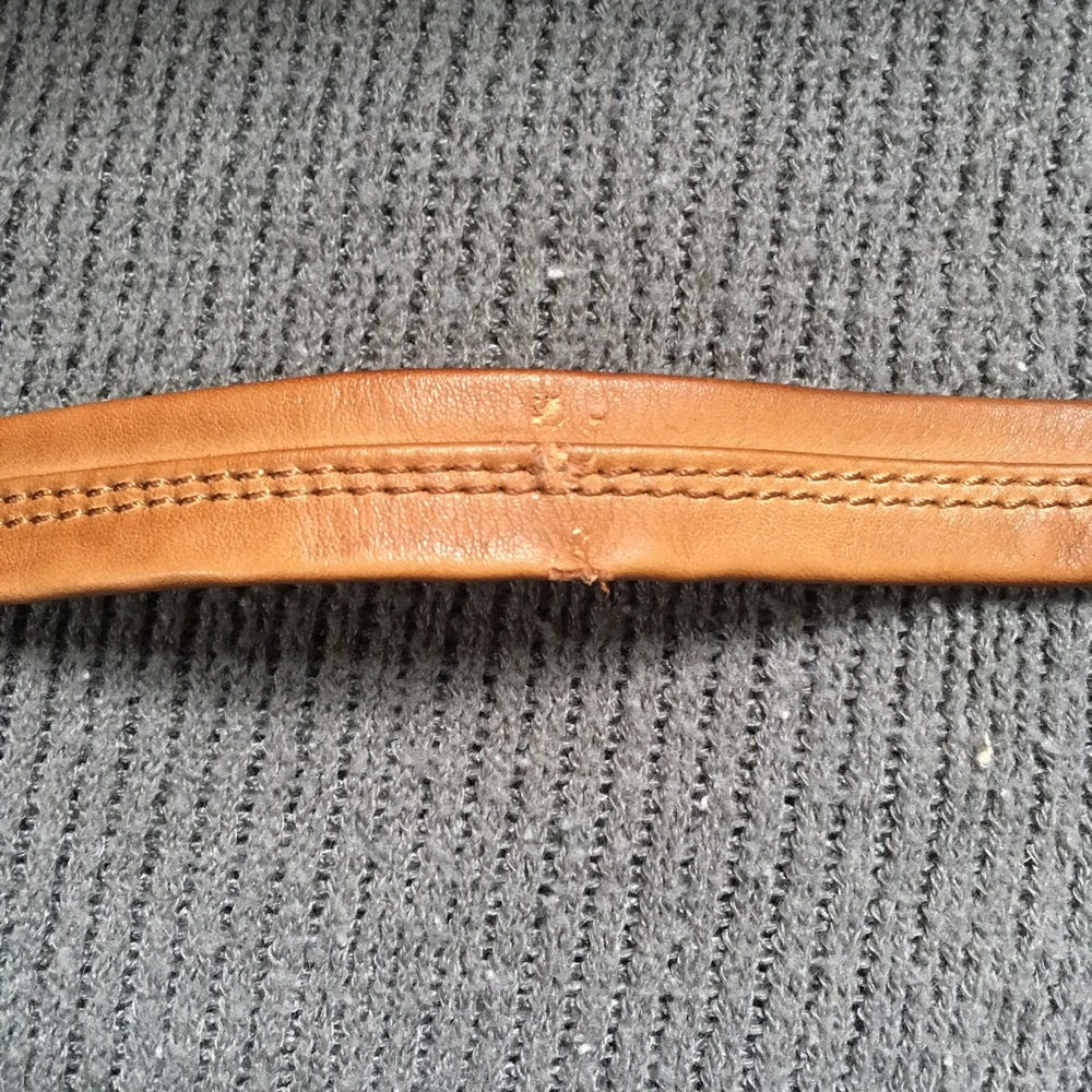 NFS- photo of old trend cross body strap damage