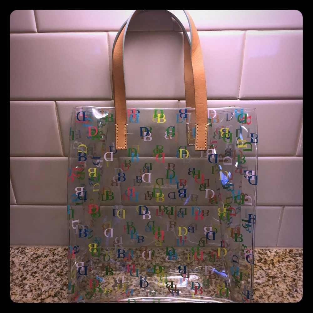 DOONEY & BOURKE: clear bag and colorful DBs.
