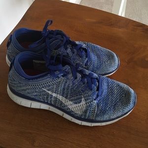 Blue and White Nike flyknit 5.0