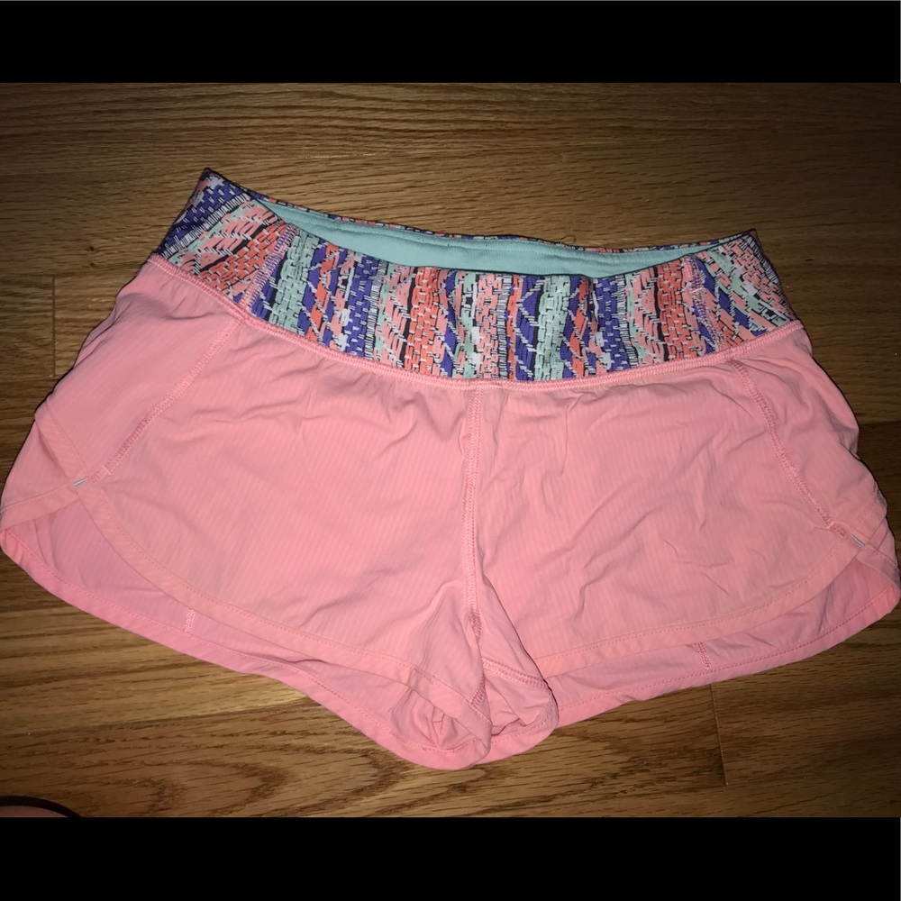 Peach ivivva "speedy short" with tribal pattern