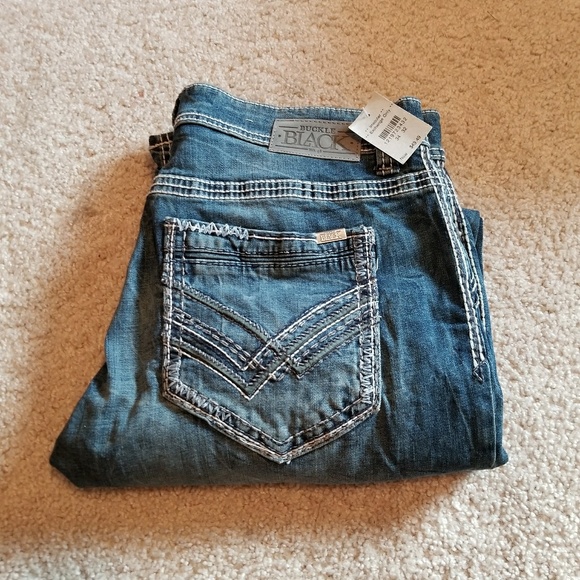 black jeans with buckles