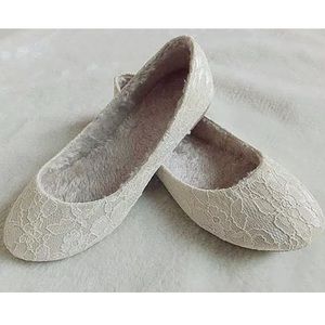 White lace flats. Warm fur inside shoe. Never worn