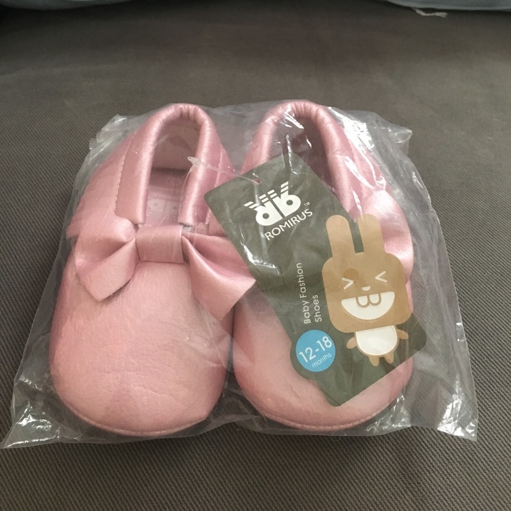 Pink crib moccasins