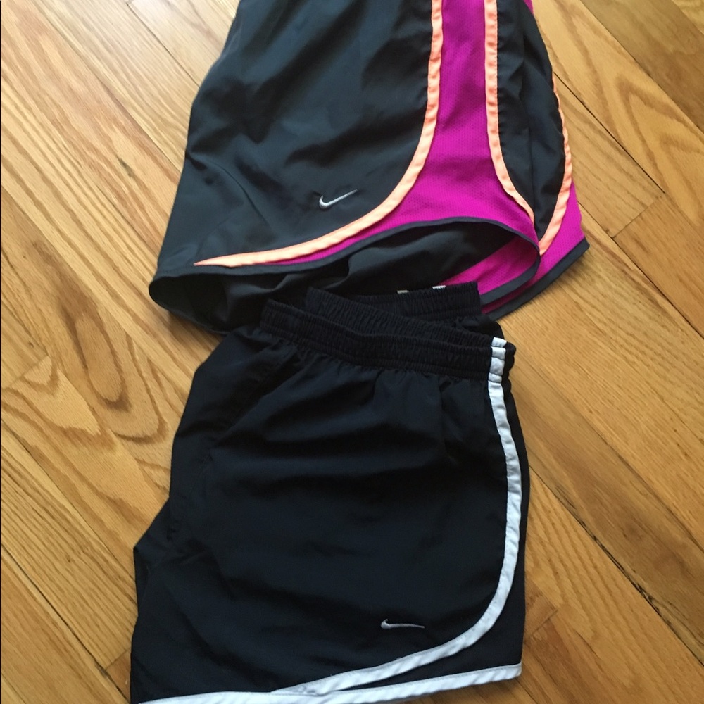 Two pairs of Nike tempo running shorts