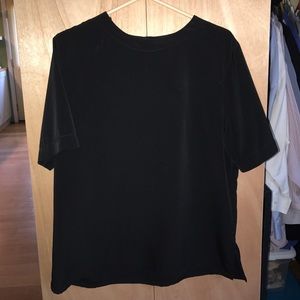 a plain black silky T-shirt