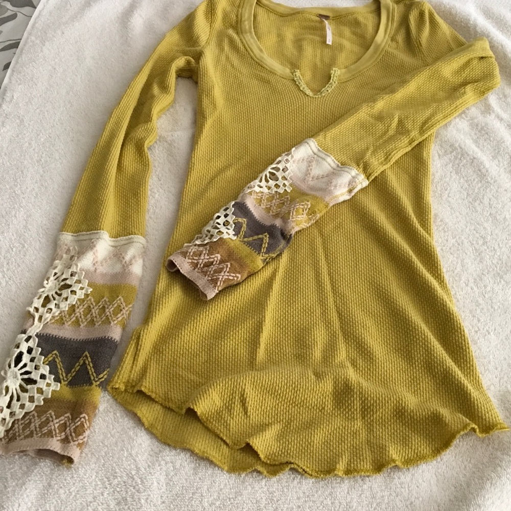 Free People thermal top with elegant sleeve detail