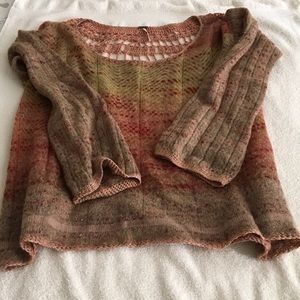 Free People embroidered sweater.