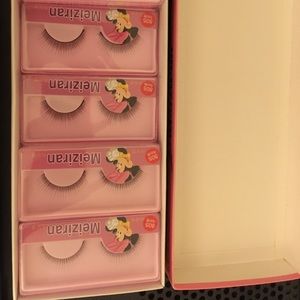 Eight pairs of fake lashes
