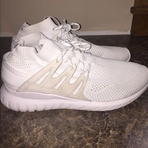 All white adidas primeknit tubulars