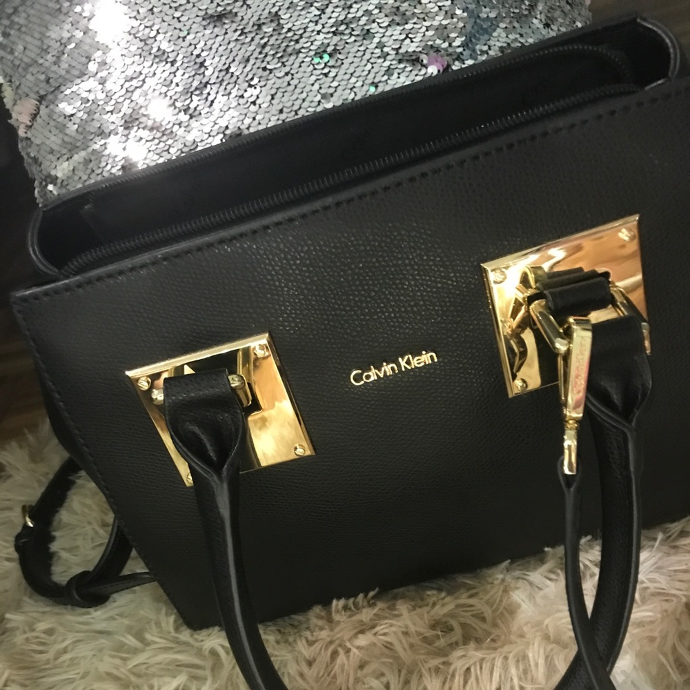 -SOLD-   Calvin Klein Mercury small satchel