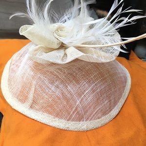 Cream colored fascinator