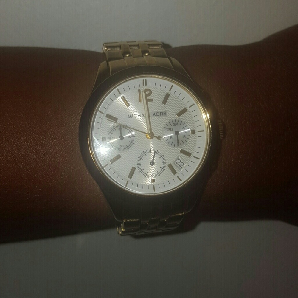 Gold MK watch