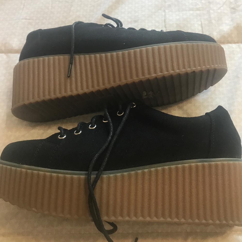 Black platform sneakers