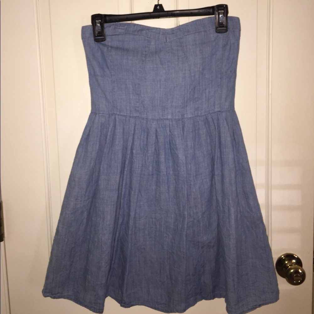Blue denim strapless dress.
